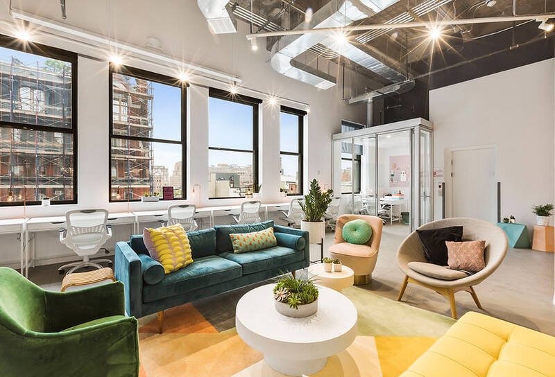 Modern commercial office with exposed HVAC systems