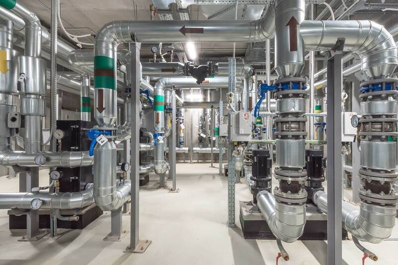 Stainless steel pipes and valves in a mechanical room